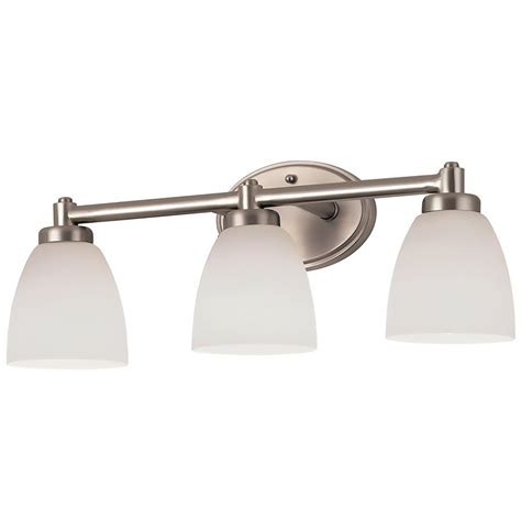 Lowepercent27s vanity lights brushed nickel - Fall in love with a lighting experience that epitomizes relaxed elegance by mingling functional design with subtle, sophisticated forms with the Replay collection's modern three-light bath and vanity bracket. A smooth, circular backplate coated in an understated brushed nickel finish sets a tone of refined aesthetic taste. Smooth, round bars conjoin at crisp right angles to hold small ...